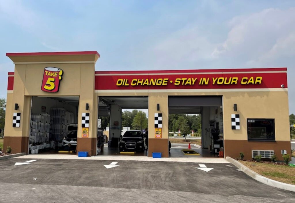 Automotive service building exterior with canopy and signage